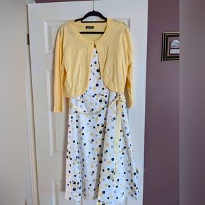Polka dot dress with yellow shrug